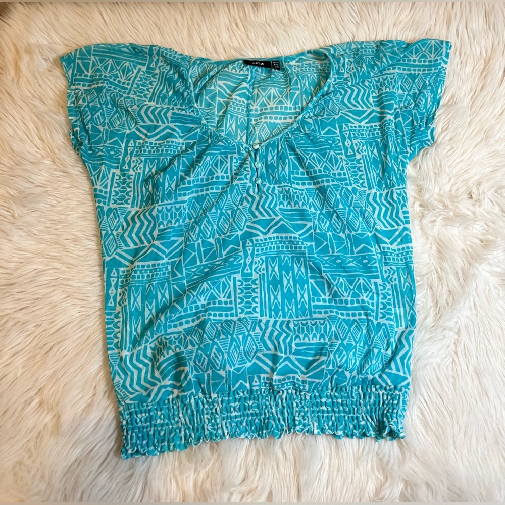 APT.V blue shirt. The size is XS